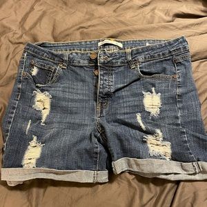 High wasted blue ripped shorts